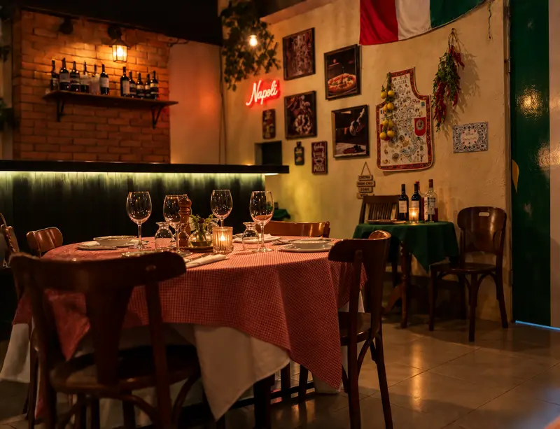 Leonezzi's dining room, brick wall and laid tables